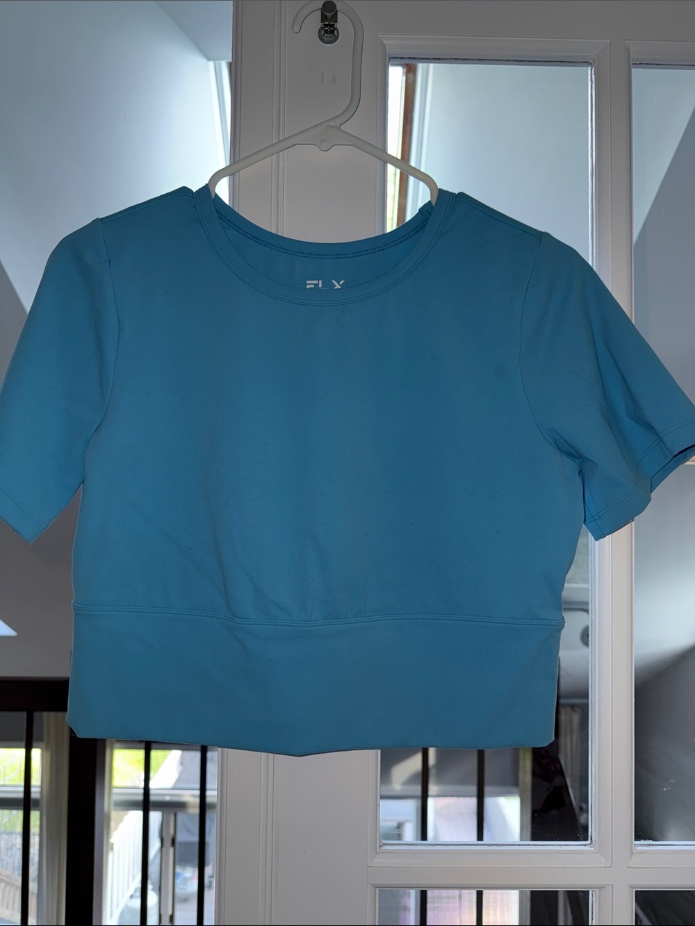 104. FLX travel leisure crop tee